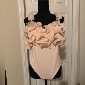 NWT Joie Elegant unique blush pink bodysuit top size L with ruffled details.